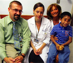 photo of Oswaldo and Drs. Rhodes & Tye