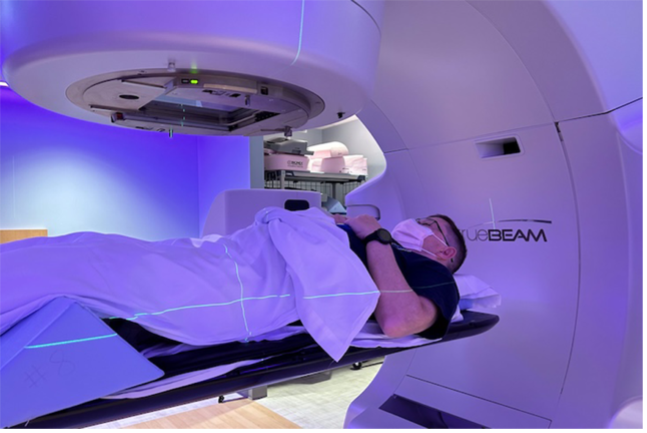 Leitz receiving stereotactic radiation in machine