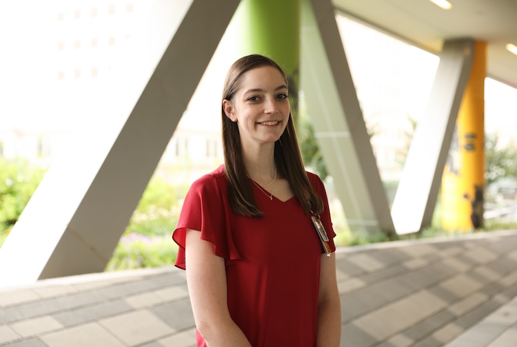 woman in red shirt